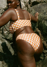 women_by_rocks_wearing_scarlett_checker_soft_cup_bikini_top