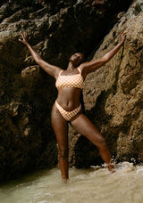 women_by_rocks_wearing_scarlett_checkered_bikini_set